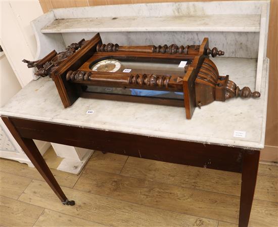 An Edwardian mahogany and satinwood marble top washstand W.122cm